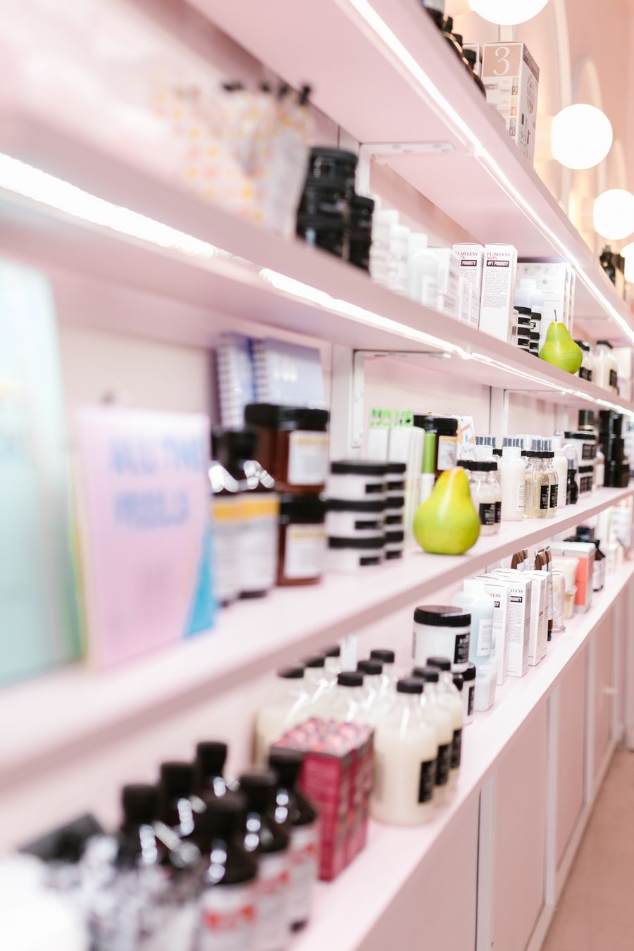 Shelves of hair care products in a salon
